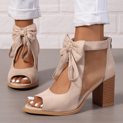 EVELYNRA – LUNETTE BOW HEELS